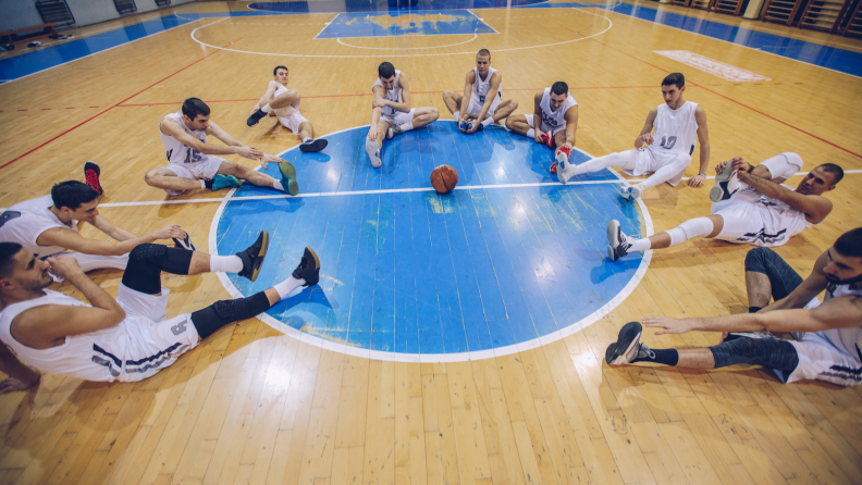 Basketball team stretching