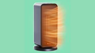 Space heater radiating orange light on green background
