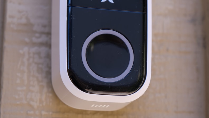 Abode Wireless Video Doorbell mounted outside of home.