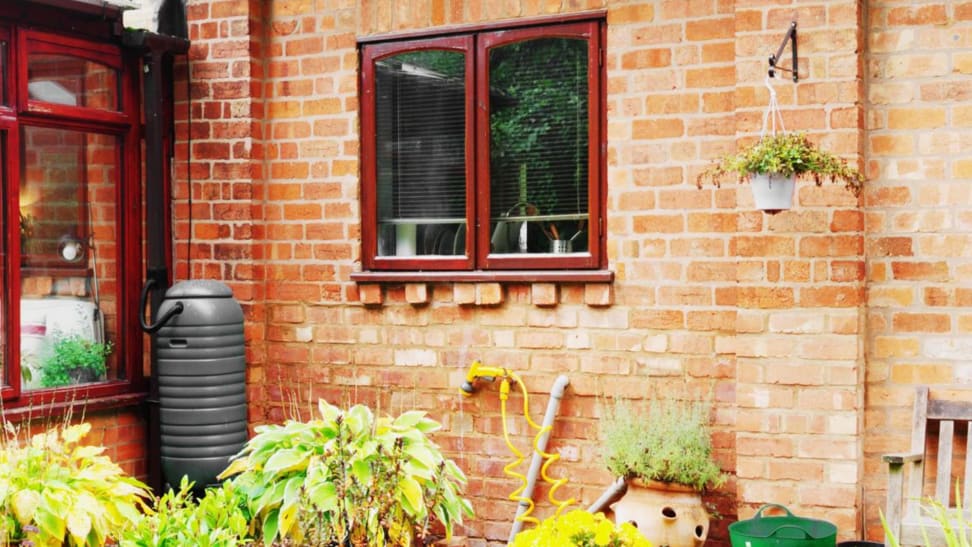 A rain barrel is an eco-friendly option for watering your yard