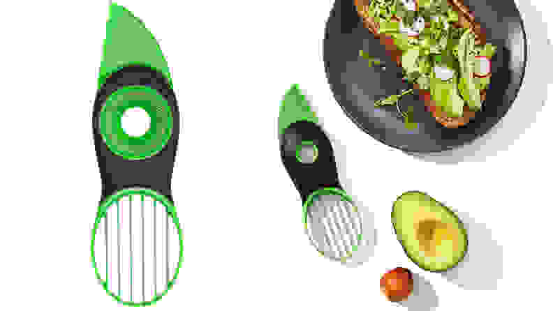 OXO avocado slicer next to half an avocado and avocado toast.