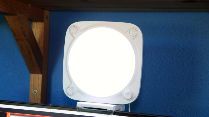 The Elgato Key Light Neo, a white, rounded square key light on top of a monitor