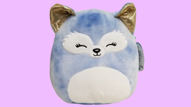 Product shot of Melani The Blue Fox plush Squishmallow toy.