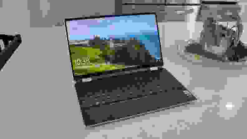 A laptop on a table, open