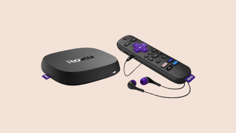 Roku Ultra box and remote against beige background