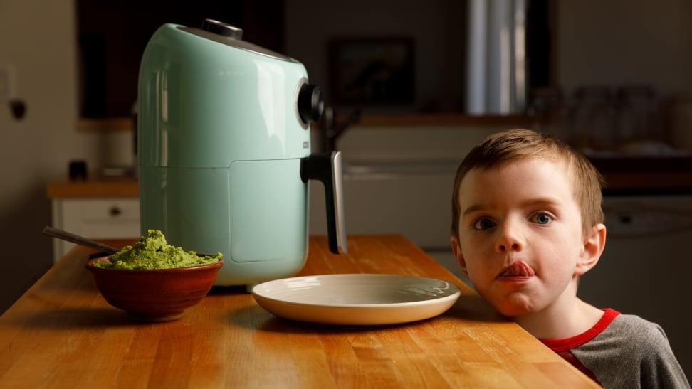 5 year old boy with the Dash compact air fryer