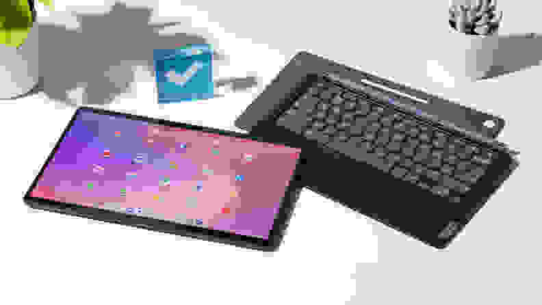 The Lenovo IdeaPad Duet 5 screen detached from the keyboard on a white desk.