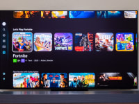 The Samsung S95F OLED TV with games on its bright screen