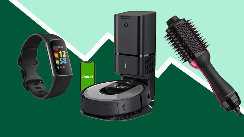 A fitness tracker, robot vacuum, and hair brush on a green background