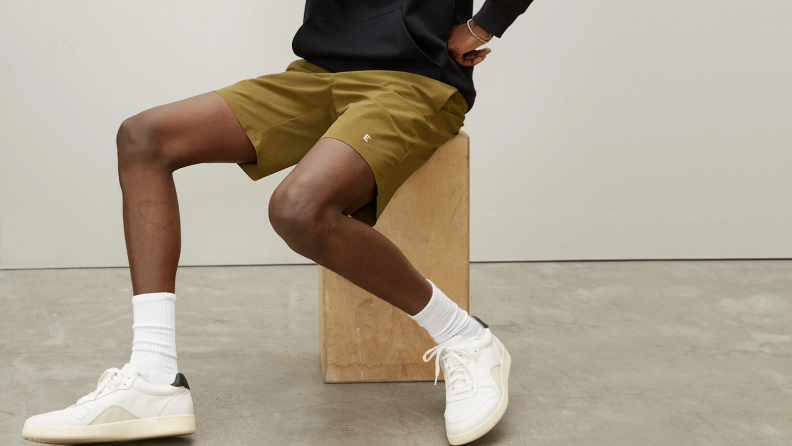 man wearing everlane sport shorts