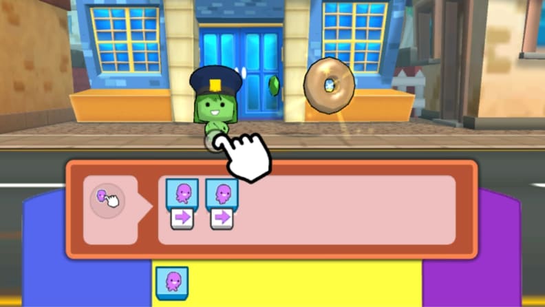 A finger points at a character, allowing the user to see what they are supposed to do as opposed to reading it