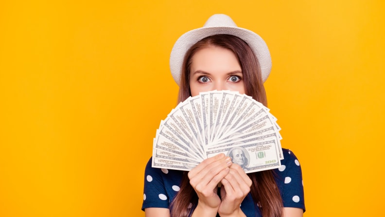 Woman holding money