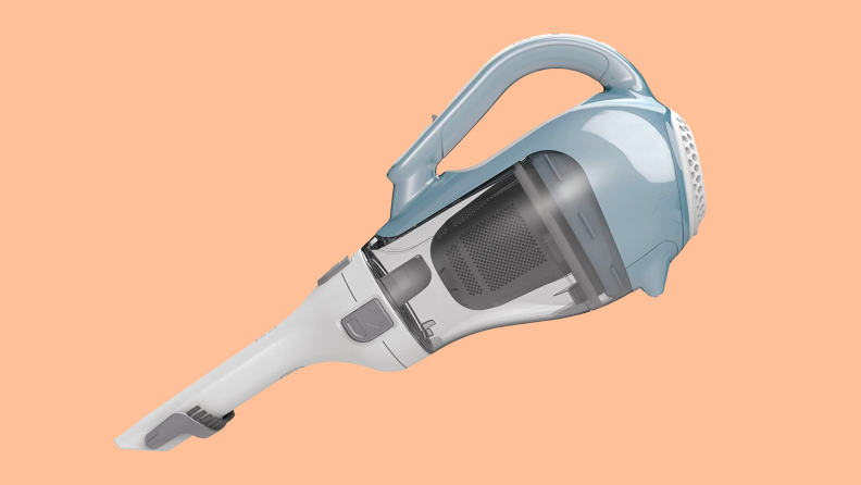 A Black + Decker vacuum against a peach background