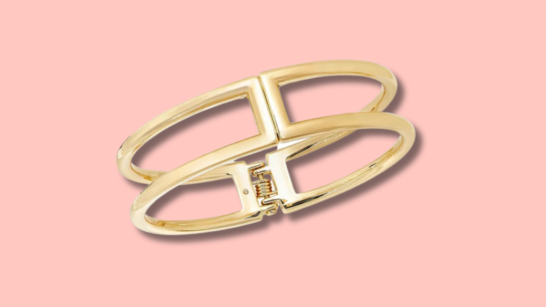 The Gold-Tone Hinge Bracelet is a timeless piece of jewelry.