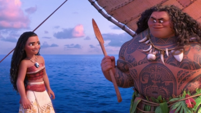 A still from 'Moana' featuring Moana and Maui standing together on a boat.