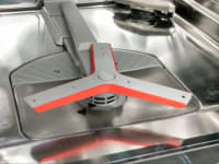 A close-up of the Bosch Power Control Spray Arm at the bottom of the 800 Series dishwasher.