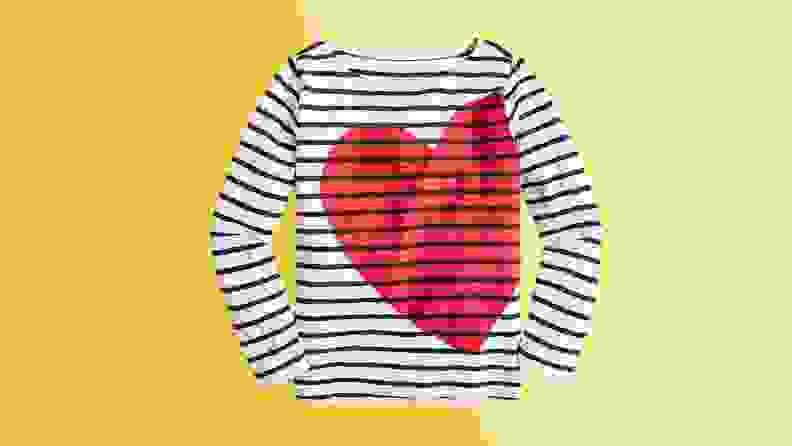 Black and white striped long-sleeved children's shirt with red heart shirt.