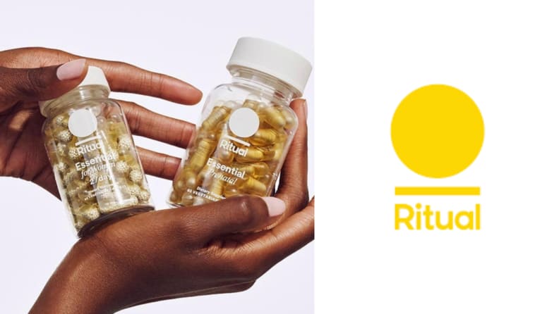 hands holding two bottles of Ritual vitamins