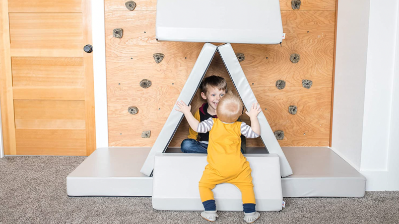 A Foamnasium couch built into a playhouse.