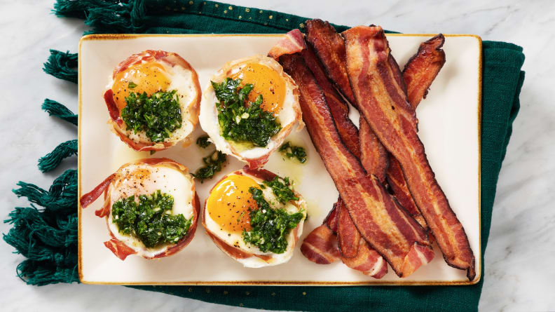 A plate of prosciutto-egg bites and bacon