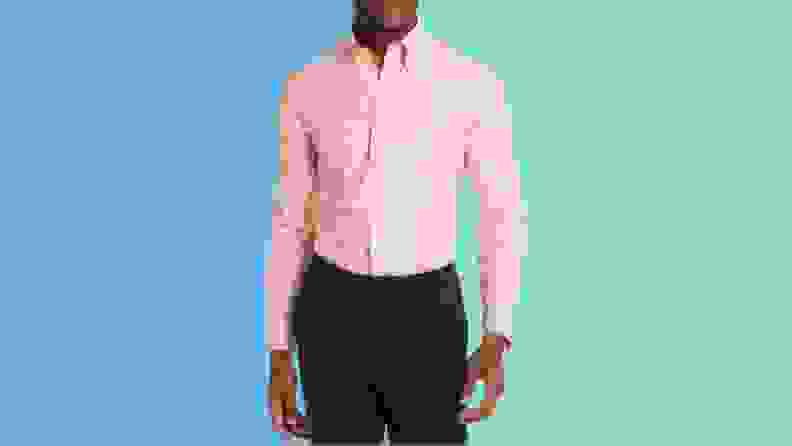 man in peach button down shirt