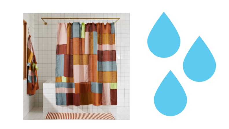 A colorful patchwork shower curtain in a bathroom