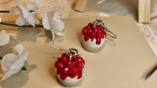 Earring that look like cheesecake.