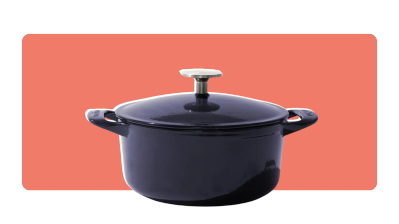 A Made In Round Enameled Cast Iron Dutch Oven in Harbour Blue color with lid on top.