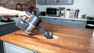 The LG Cordzero A949KTMS cleaning sugar off a countertop