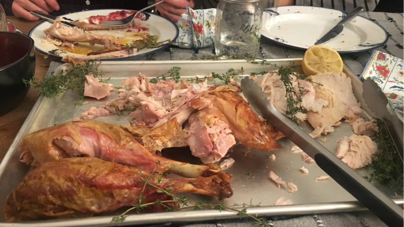 Sliced turkey mid-meal on table