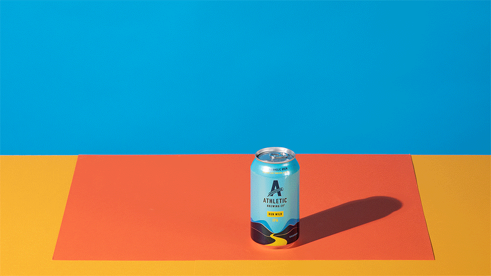 A gif of cans and bottles of nonalcoholic beer appearing on a colorful surface