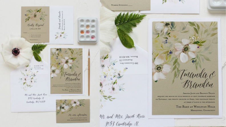 A stack of floral wedding invitations.