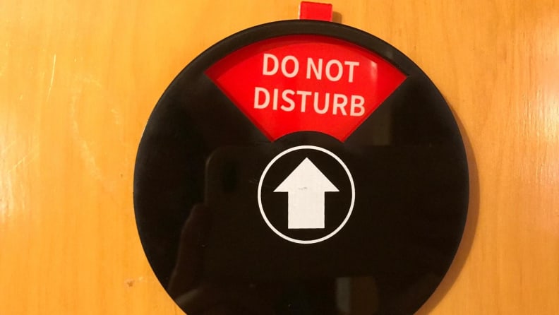 The Privacy Sign set to the red setting, "do not distrub."