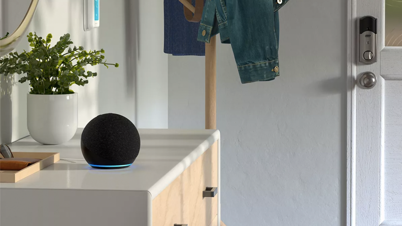 A room with an Echo Dot on top of a drawer