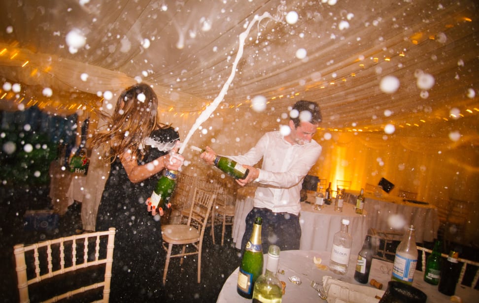 Partygoers celebrate with sparkling wine