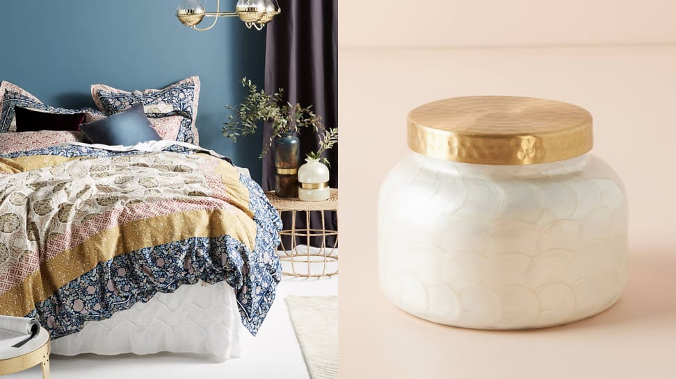 Anthropologie bedding and a Capri Blue candle.