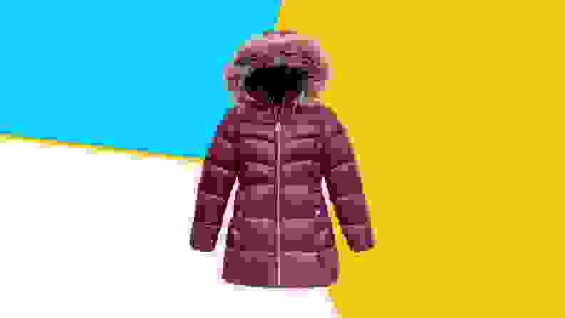 A purple Michael Kors winter jacket on a blue and yellow background.