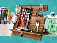 White pen organizer, wooden docking station with smartphone, a pair of glasses a set of keys on top and a clear jar with lid holding dental flossing sticks.