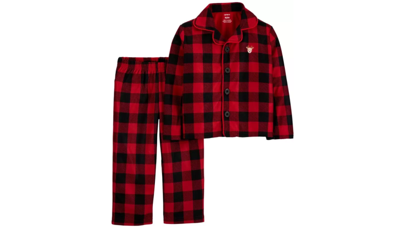 An image of a pair of buffalo-plaid pajama pants and a pajama shirt in red and black.