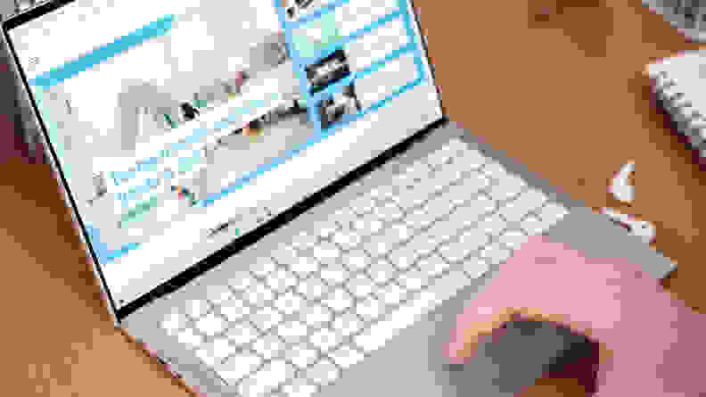 A person uses the trackpad