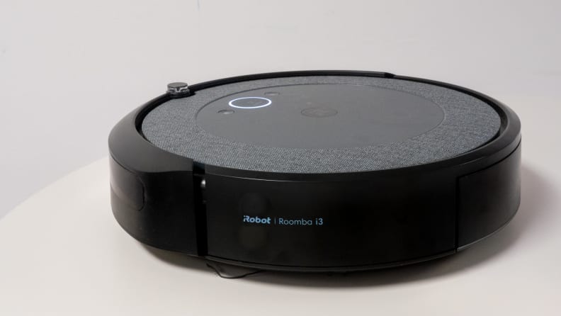 The iRobot Roomba i3+ on a table.