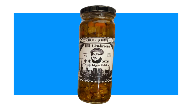 Jar of giardiniera on blue background