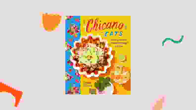 Chicano Eats cookbook against a light pink background.