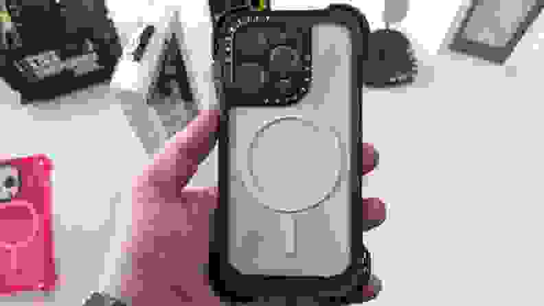A closeup of a person holding a smartphone with the Casetify case.