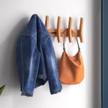 Product image of Mercury Row Sifford Solid Wood 5-Hook Wall-Mounted Coat Rack