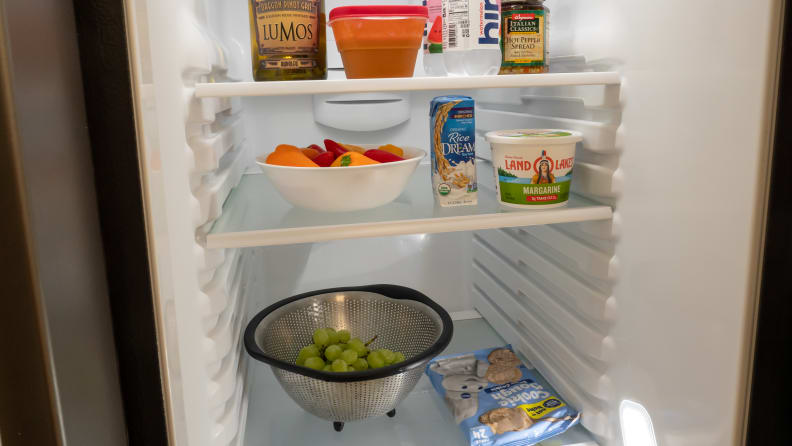 This GE has four LED lights in the fridge section that illuminate the entire cavity.