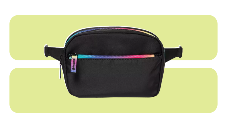 A black fanny pack with rainbow zippers.