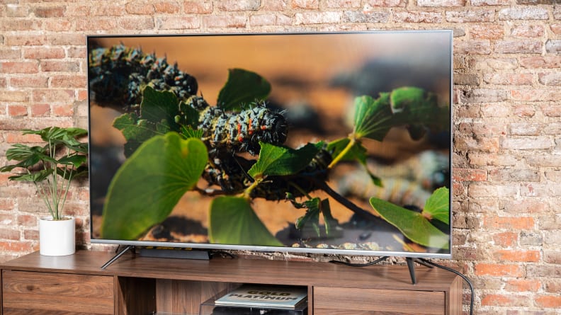 The Amazon Fire TV Omni displaying 4K/HDR content in a living room setting