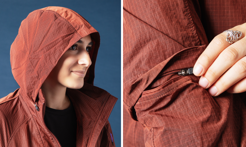 Close up on rain jacket hood and zippers.
