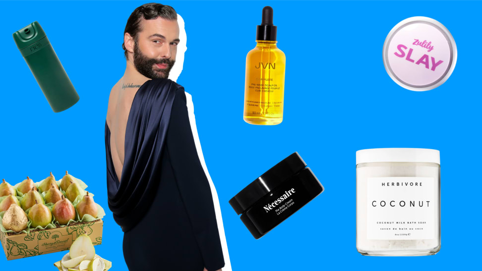 Jonathan Van Ness with his favorite things, including body balms, bath soaks, travel bottles, hair oil, and pears.